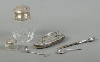 A quantity of silver and silver mounted items, to include trinket jar, nail buffer, letter opener