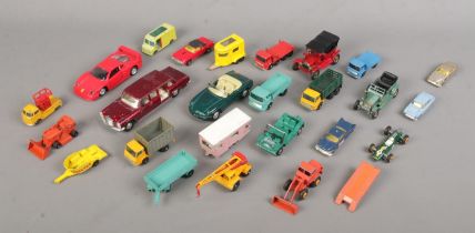 A quantity of diecast scale model vehicles, to include examples by Matchbox, Husky and Lesney.
