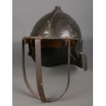 A reproduction fibreglass Zischagge 'Lobster Tailed' pot helmet.