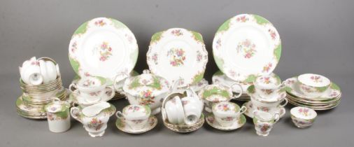 An extensive collection of Paragon Rockingham pattern dinnerwares, to include large plates, bowls,