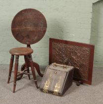 An oak tilt top wine table with turned oak stool wood and copper fire screen and Victorian oak and