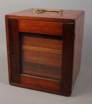 A small mahogany specimen cabinet with glazed door featuring fourteen fitted drawers. Approx.