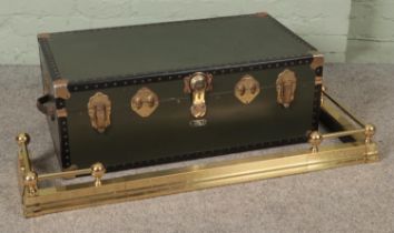 A large Mossman of London travel trunk, together with a three piece extendable fender. Dimensions of