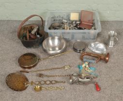 A box of metalwares. Includes copper & brass bugle, jam pan, cutlery, casters, companion set, rabbit