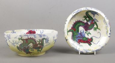Two pieces of Bursley Ware ceramics in the 'Dragon' design, with yellow lustre glaze, dragon motif