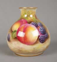 A Royal Worcester narrow neck squat vase, depicting a still life scene of fruit. Stamped to base