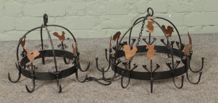 Two iron game hangers one example in the form of an eight point crowns decorated with gilt painted