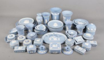 A large collection of Wedgwood blue Jasperware. Includes 'Mother' plates, vases, trinket boxes,