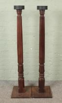 A pair of large carved planted stands with pedestal reeded columns. Hx146cm