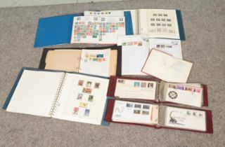 A good collection of partially filled international stamp albums to include selection of Jersey Mint