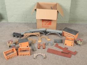 A large box of railway scenery and buildings. Includes Kibri examples, bridges, castle parts, etc.