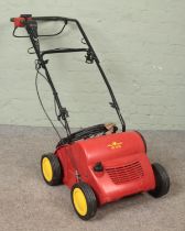 A Wolf-Garden electric lawn scarifier, model No. UV 34 E.