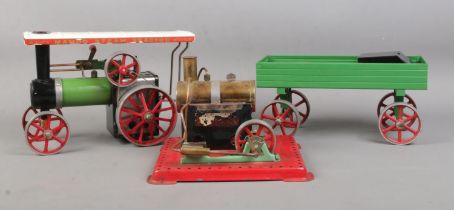 A Mamod Steam Tractor, with cart and additional Mamod Stationary Engine. Chimney missing from