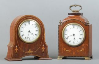 Two mahogany cased Edwardian mantle clocks, with banded inlay decoration. Featuring Roman Numeral
