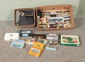 One box of assorted diecast vehicles and one box of Minic Motorways track to include several Eddie