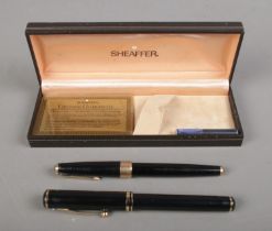 A boxed Sheaffer fountain pen set