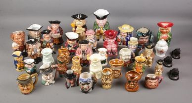 A large quantity of character jugs including Tony Wood studio 82, Leonardo Collection, Staffordshire