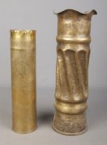 Two trench art artillery shell vases to include example featuring monogram and dated 1916.