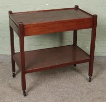 A mahogany tea trolley with drawer to either side. Hx73cm Wx77cm Dx42cm