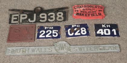 A collection of vintage metal signs to include Chas & Roberts Builders, South Wales Switchgear,