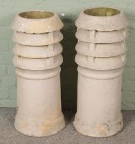 A pair of vented chimney pots. (77cm)