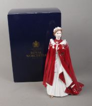 A boxed Royal Worcester figure of Queen Elizabeth II titled In Celebration of the Queen's 80th