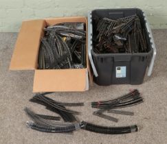 Two large boxes of model railway track, mostly OO gauge to include Hornby Dublo examples.