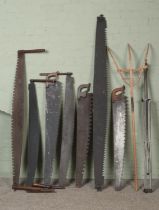 A good collection of vintage saws to include several two-man examples.