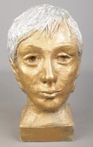 A gilt painted plaster bust of a woman. (34cm)