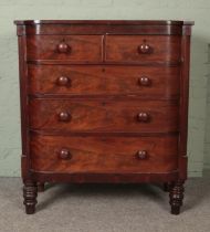 A Victorian mahogany two over three chest of drawers raised on turned supports. Approx. dimensions