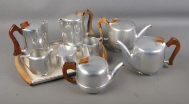 A quantity of Picquot ware including tray, teapots, coffeepots, jugs and sugar bowl.