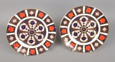 Two Royal Crown Derby Imari pattern circular plates.