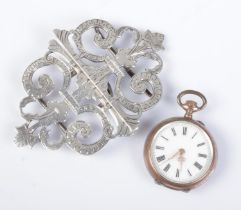 A Victorian silver nurses belt buckle along with a Swiss silver fob watch. Nurses belt assayed