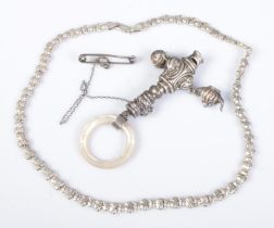 A silver teether/whistle along with an Italian silver teddy bear link necklace. Necklace weight 16.
