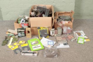 Three boxes of assorted model railway scenery, building and diorama supplies to include Peco,