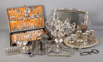 A quantity of metalwares including Super Inox cutlery set, silver plate trays, teapots, jugs, tongs,