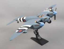 A Limited Edition Corgi Aviation Archive 1/32 scale DeHavilland Mosquito PRXVI (AA34602), on display