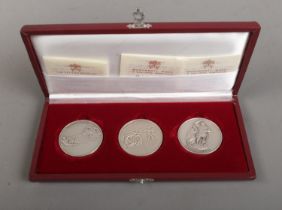 A set of three sterling silver coins from the Vatican Museum commemorating Michelangelo.
