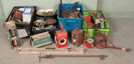 Four boxes of mostly vintage tools. Includes Wolf, Linear car battery charger, Tilley lamp, saws,