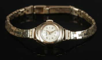 A ladies 9ct Gold Rotary manual wind wristwatch, with both the case and strap stamped '375'. 15