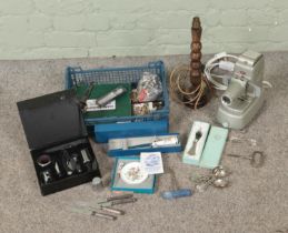 A collection of miscellaneous collectables to include Royal Worcester cake knife, corkscrews,