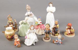 A quantity of ceramic figures. Includes Royal Doulton ladies, Goebel, Nao, etc.