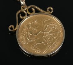 A 1910 half sovereign, situated within a 9ct Gold mount suspended on a 9ct Gold chain. Total weight: