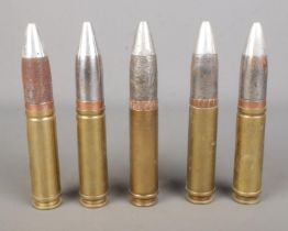 Five practice Aden canon rounds all stamped for Royal Ordnance Factory Chorley and dated between
