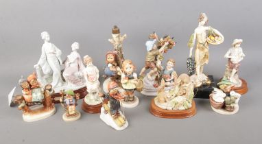 A collection of ceramic and resin figures to include Leonardo Collection, Depose, Geobel, etc.