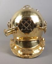 A reproduction US Navy diving helmet; Mark V, with plaque for Morse Diving Equipment Co. Boston M.