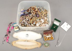 A box of costume jewellery. Includes boxed simulated pearl necklace, beads, earrings, cuff links,