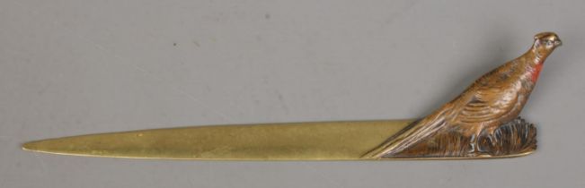 A bronze letter opener decorated with a cold painted pheasant. Stamped Made In Austria to underside.