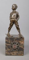 After Johann Ferdinand Preiss, a bronze sculpture of a young boy wearing skis. Having HJ Ski