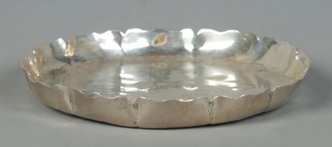 A heavy silver shallow dish with scalloped edge. Assayed London 1988 by Dorothy May Budd. Diameter